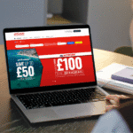 Person looking at laptop displaying Jet2 website with holiday deals, relating to how to Book Jet2 Holidays Direct or With a Travel Agent.