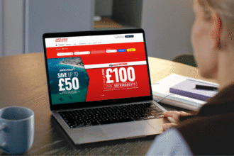 Person looking at laptop displaying Jet2 website with holiday deals, relating to how to Book Jet2 Holidays Direct or With a Travel Agent.
